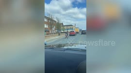 Bizarre moment OAP on mobility scooter drags fence down busy road in Grimsby