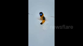 Fearless Skier Braves Deep Snow in Altay Prefecture, China