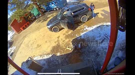 Woman Slips on Ice While Walking Back to House