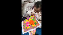 Talented toddler shows off impressive embroidery skills in southwestern China