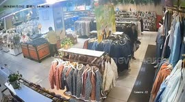 Shop floor collapses and sucks woman into sinkhole