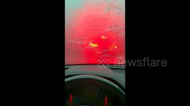 Egg-sized hailstones smash through family's car in eastern China