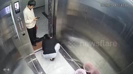 Chinese woman's new phone plunges through elevator shaft after accidental drop on exit