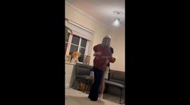 Young knight gets disarmed by his mother in a playful joust of judo