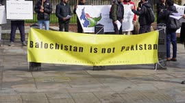 A hand full of protesters gather opposite Number 10 for the historical region of Balchoistan