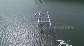 Baltimore bridge crash investigators board cargo ship