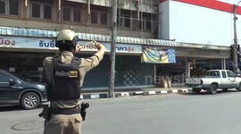 Police carry slingshots for protection against notorious monkey gangs in Thailand