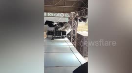 Storm blows away chairs at outdoor party venue in Thailand