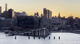 Sailing by Little Island on the Hudson River in Manhattan at Sunrise