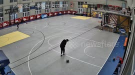 Close Call: Man Narrowly Avoids Exploding Basketball in China