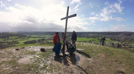Cross placed high on a Gloucestershire Hill continues a Good Friday tradition dating back more than half a century