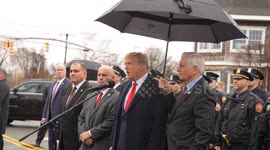 Former President Donald Trump Jr. listens as Bruce Blakeman speaks at the wake for NYPD officer Jonathan Diller's Funeral