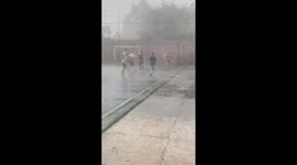 Playing Football In The Pouring Rain