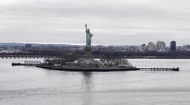 Sailing by the Statue of Liberty on a Cruise Ship departing from New York City
