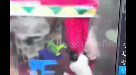 Man lifted into air along with shed by sudden strong wind in southern China