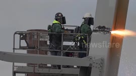 Demolition crews work to remove collapsed Baltimore bridge piece by piece
