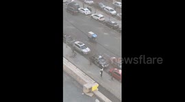 Dad engages in dance with daughter after picking up her from school in Shenyang, China