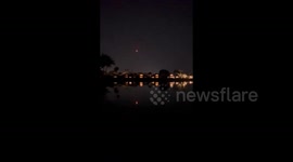 US: Falcon 9 Streaks Across Night Sky As SpaceX Launches 23 Starlink Satellites