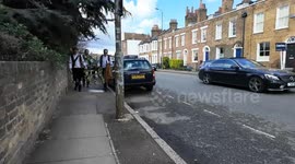 The Blackheath Morris Men out and about on the streets of Greenwich as they perform their traditional English dances.