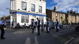The Blackheath Morris Men perform their age-old dancing on the streets of Greenwich
