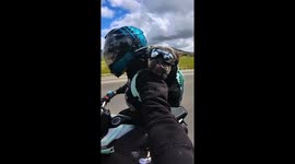 Coolest dog ever? Pooch chills on owner's back during motorcycle ride