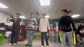 Classmates perform song with different length pipes