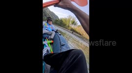 Unprovoked stone attack terrifies father and sons during kayak trip at Chinese scenic spot