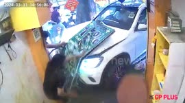 Six injured when Mercedes crashes into cafe in India