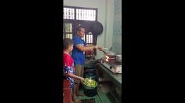 Father-son cooking mishap: Thailand