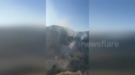 Guatemalan Air Force Helicopter Dispatches 13,000 Gallons of Water to Combat Forest Fire in Los Amates