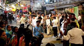 Indian people take part in traditional rajasthani ghoomar stick dance in India