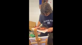 Brushing romance: Adorable couple expresses their love through portrait painting