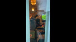 Woman films her neighbor a.k.a. her brother going crazy while watching football