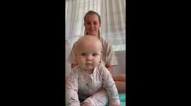 Mom's loving massages leave baby in ecstatic drools and giggles