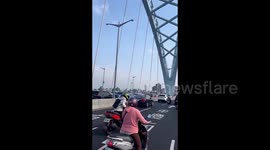 Motorcyclists sway as bridge shakes violently during Taiwan earthquake