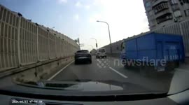 Dashcam footage shows vehicles swinging on overpass as it shakes violently during Taiwan earthquake