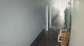 Storm blows rubbish into building in Thailand
