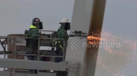 Engineers dismantle Baltimore bridge following cargo ship collision