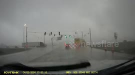 Dashcam captures Indiana motorist's harrowing encounter as tornado flips car over