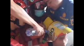 Jakarta firefighters remove metal can stuck on child's head