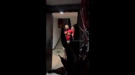 Surprise birthday serenade has man falling down in shock