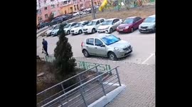 Metal fence topples onto a passerby in Balashikha, Russia, during wind gust
