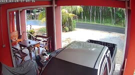 Speeding pickup cartwheels onto yard in Thailand