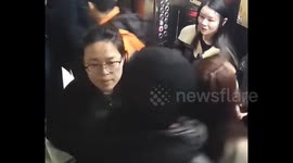 Heroic Chinese officer's quick action nabs fraudsters in elevator showdown