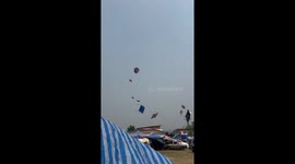Wind uproots marquees and umbrellas in Thailand heat wave