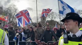 Al-Quds Day Rally, organized by the Islamic Human Rights Commission. The event, which calls for the denunciation of the ongoing conflict in the Middle East, sees participants gather at the Home Office and march towards Downing Street.