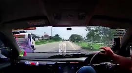 Dramatic moment driver swerves to avoid fallen motorcycle rider