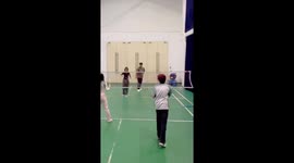 Friends have amusing badminton fail when one is whacked in the face