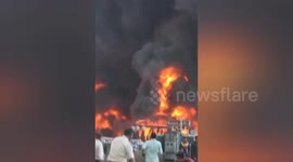 Residents flee as fire rips through power distribution company in India