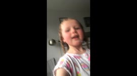 Adorable girl thinks she is on tik tok